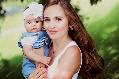 Premium Photo Portrait Of Beautiful Mother With Her Cute Daughter Having Fun Together Caring