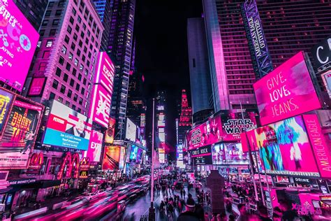 Nighttime Photos Capture Vibrant Pink Glow Of Times Squares Neon Lights