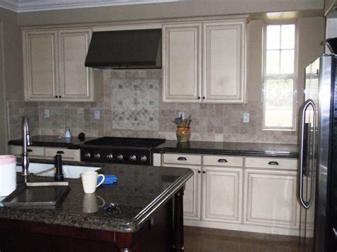 It is the place you entertain. BDG Style: PAINTING KITCHEN CABINETS