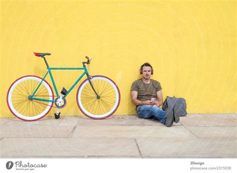 Young Man Wearing Sunglasses Relaxing On The Floor A Royalty Free