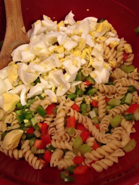 With pasta, tomatoes, cheese a stupidly easy italian pasta salad with rotini, juicy tomatoes, fresh mozzarella, red onion, salami, olives. Festive Pasta Salad (S) - Mrs. Criddles Kitchen