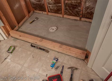 A shower dam divides the shower from the bathroom flooring to keep water contained and allows for two different flooring materials, but removing it and long, skinny tiles.as a variation on the classic subway tile, elongated rectangular tiles are an edgier and more modern take on the traditional style. DIY Tile Shower: Before and After - Love, Pasta, and a ...