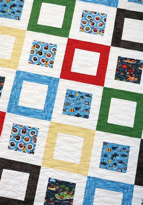 A Bright Corner Framed Squares Throw Sized Free Quilt Pattern