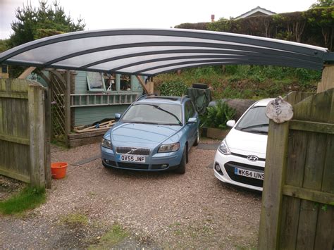 A vehicle canopy is a rarely used type of door for cars. 2 Car Carport for Covering your Cars | Kappion Carports ...