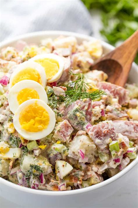 Easy creamy potato salad recipe with lots of tips for making it best, including the best potatoes to we simmer potatoes whole in salted water when making potato salad. Creamy Egg Potato Salad Recipe - Traditional Potato Salad Tastes Better From Scratch / Potatoes ...