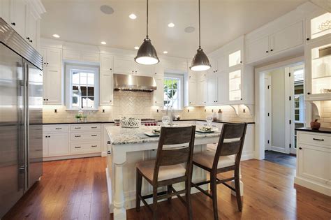 Browse photos of kitchen designs. White Shaker Style Farmhouse Kitchen - Crystal Cabinets