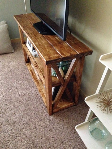 Rustic Tv Stand With X Designs On The Sides Also Works As A