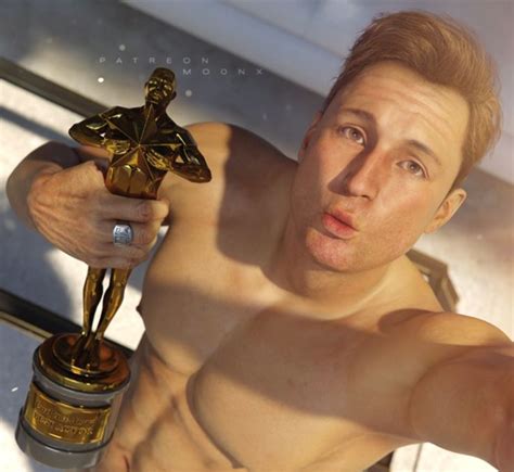 A Man With No Shirt Holding Up A Golden Trophy In His Right Hand And Looking At The Camera