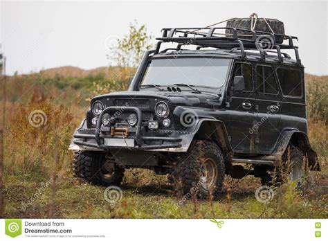 Russian Black Off Road Car Uaz In A Meadow Stock Image Image Of Jeep