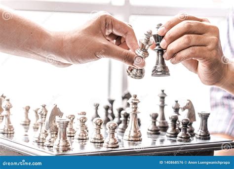 Hand Of Businessman Moving Chess Figure Strategy Chess Board Game