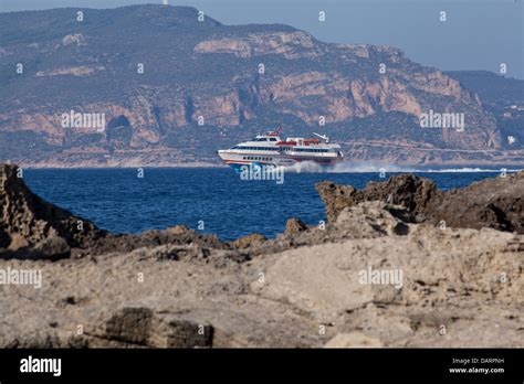 A Hydrofoil Sailing Past Favignana In The Egadi Islands Sicily Stock