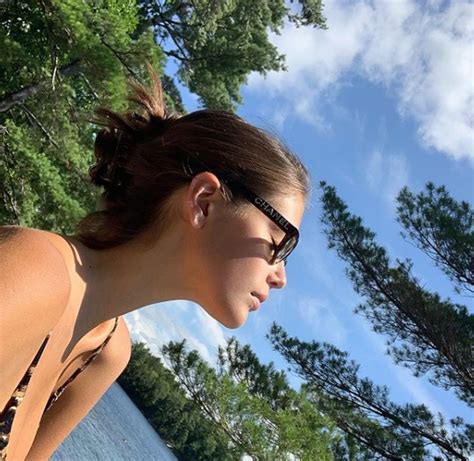 Kaia Gerber Stuns Sunbathing In Bikini By A Lake The Blast