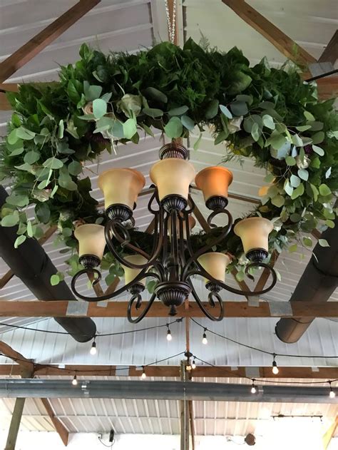 Mighty white of you (i.redd.it). Hanging installation - Greenery wreath around a light ...