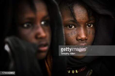 Girls In Black Scarves Facial Scar Tattoos High Res Stock Photo Getty