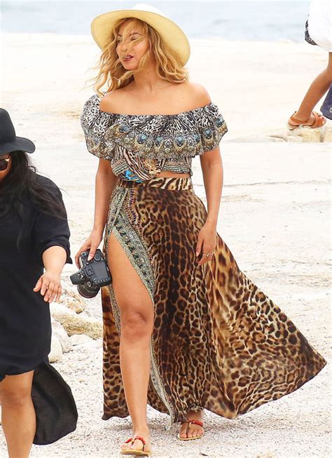 Beyonce Flashes A Lot Of Leg In Thigh Split Skirt As She Takes Snaps Of