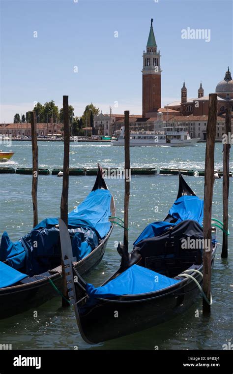 Gondolas Moored Alongside St Marks Square Venice Stock Photo Alamy