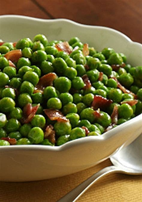 I usually do carrots,sprouts, roast parsnips and either cauliflower cheese or red cabbage. Peas with Bacon | Recipe | Dinner side dishes, Christmas dinner side dishes, Side dish recipes