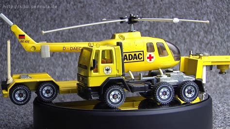 Es ist die horrorvorstellung für jeden autofahrer: Siku 3719 Ford Cargo ADAC Tieflader LKW mit Hubschrauber ...