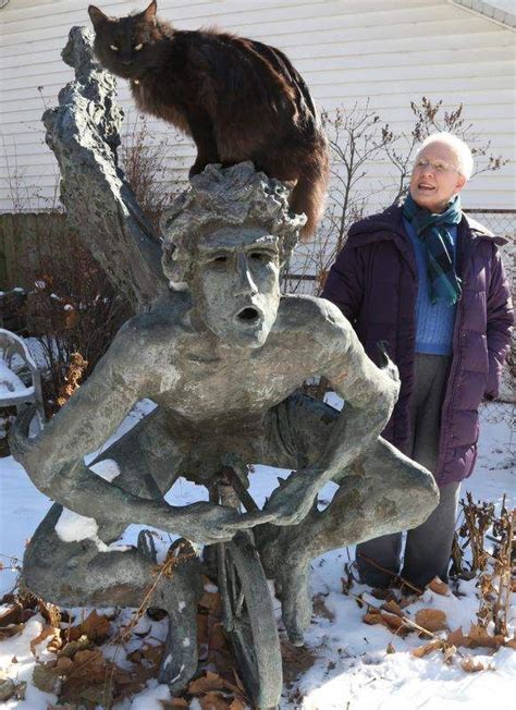Merle Hay Malls Naked Angel On Tricycle Sculpture Landed