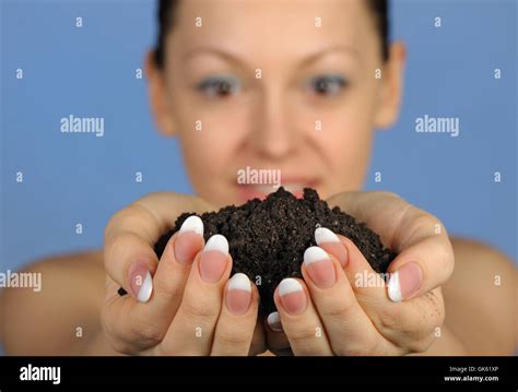 The Girl Holds In Hands Soil Stock Photo Alamy