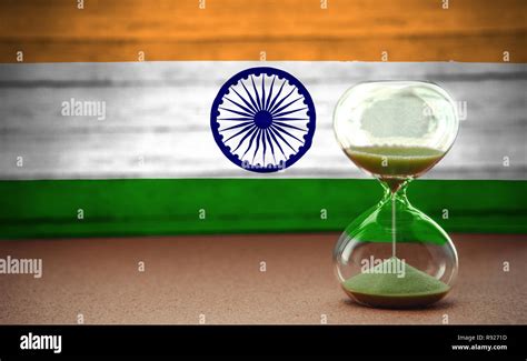 Hourglass On The Background Of The Indian Flag The Concept Of Time And Countries Space For