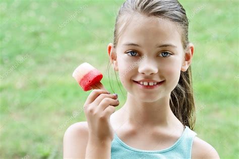 Long Little Girl Eating Popsicle