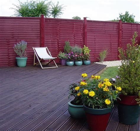 Garden Fence Wood Stain | Garden Design Ideas | Garden fencing, Garden fence, Garden ideas cheap