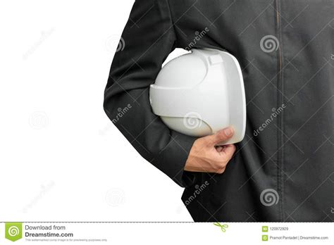 Hand Of Engineering Worker Holding White Safety Helmet Plastic In