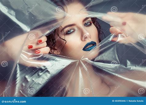 Woman With Creative Eye Makeup Peering Cellophane Stock Photo Image