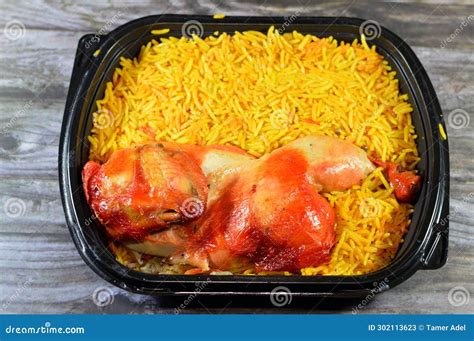 Chicken Mandi Kabsa With Long Basmati Rice Usually Served With Tomato