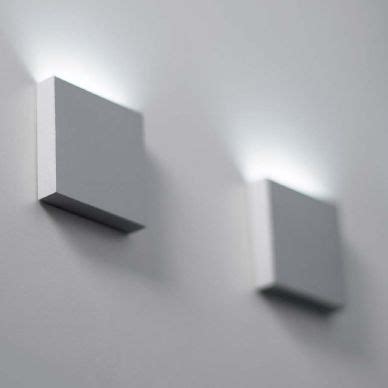 Glass wall light fixtures with attractive finishes, from high end to industrial. Decorative wall lighting, uplights, modern simple scones ...