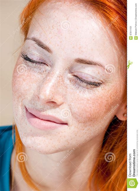Closeup Portrait Of A Young Beautiful Freckled Woman Stock Image