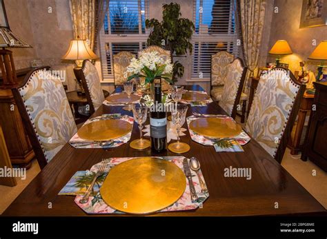 luxury dining table set for meal in dining room,england,uk Stock Photo