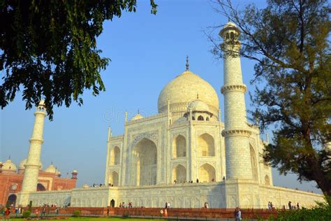 View Of The Taj Mahal At Sunrise Is An Ivory White Marble Mausoleum