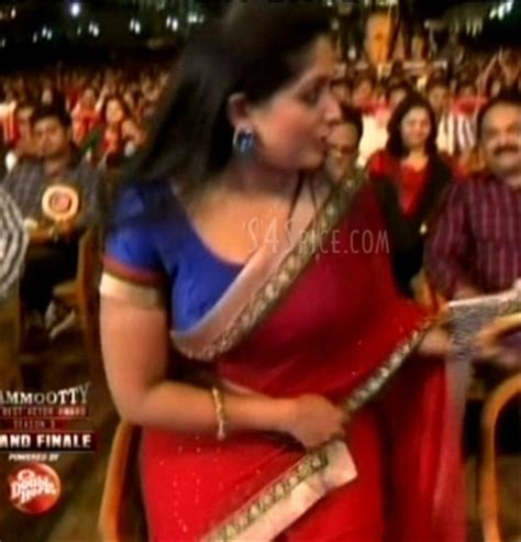 Actress Sneha Kavya Madhavan Hot Navel Show In Saree From Mammootty