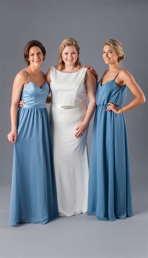 A Simple Crepe Bridal Gown With A High Neckline And Slate