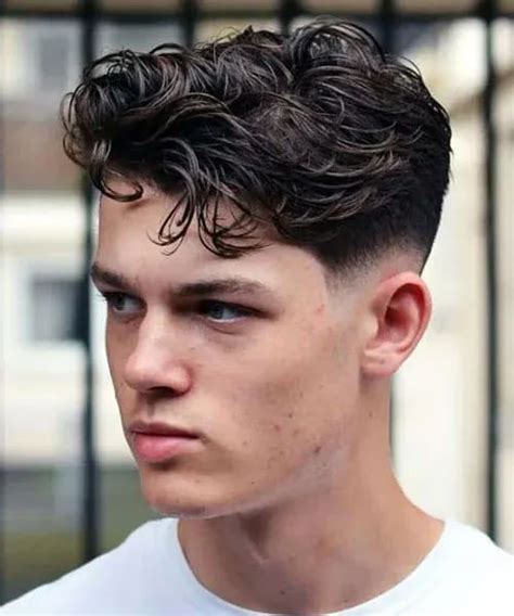 Messy Wavy Hair With Low Bald Fade Cool Bald Fade Haircuts For Men