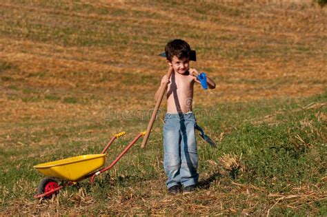 Child With Tools For Digging Stock Photo Image Of Childhood Shovel