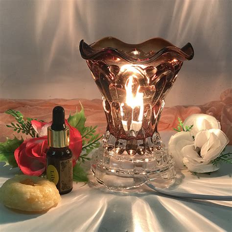 Discover our great selection of oil lamps on amazon.com. C0530-Flower Fragrance Oil lamp(assorted color) - DRL WHOLESALE