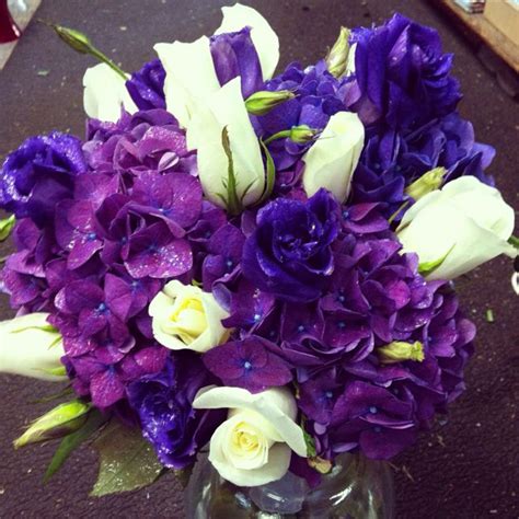 Maybe you would like to learn more about one of these? Deep purple hydrangea and lisianthus with white roses ...