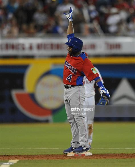 Miguel Tejada Of Dominican Republic Reacts To Hitting A Double In The
