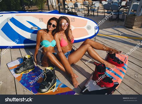 Two Sporty Girls Bikini Surf Boards Shutterstock