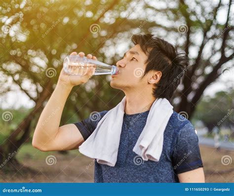 Young Sporty Man Drinking Water In Park Stock Image Image Of