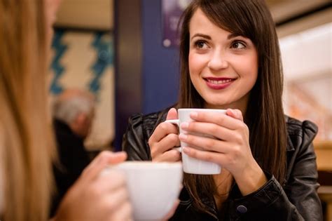Premium Photo Woman Smiling While Having Coffee