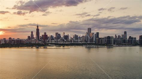 The Downtown Chicago Skyline At Sunset Seen From Lake Michigan