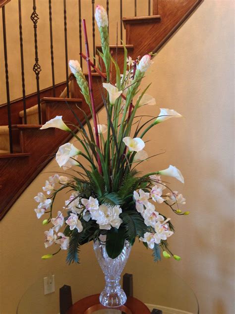 Arcadia floral design is a design studio specializing in weddings, parties and custom home floral decor. Calla lily with orchid flower arrangement for perfect ...