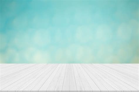 Premium Photo Empty White Wooden Table With Blue Blurred Background