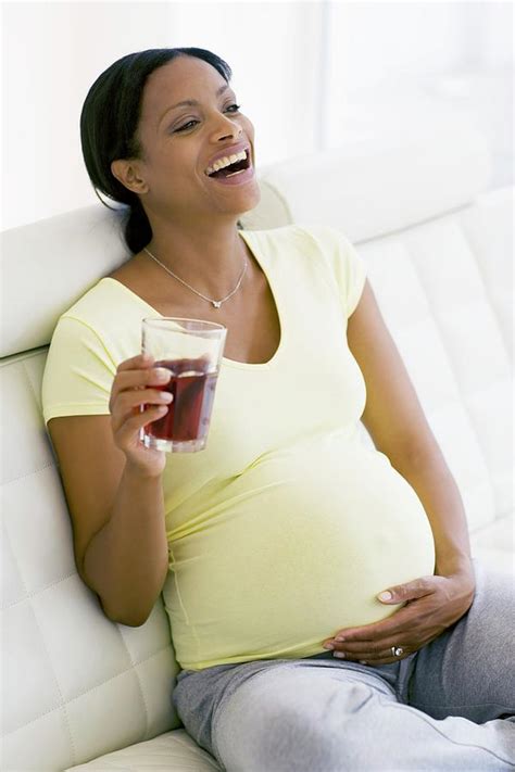 Pregnant Woman Laughing Photograph By Ian Hootonscience Photo Library