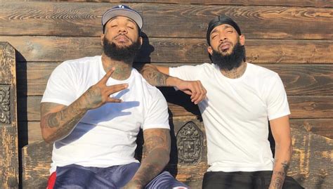 The Game Honors Nipsey Hussle With Tattoo Message At Memorial Site God Will Rise Urban Islandz