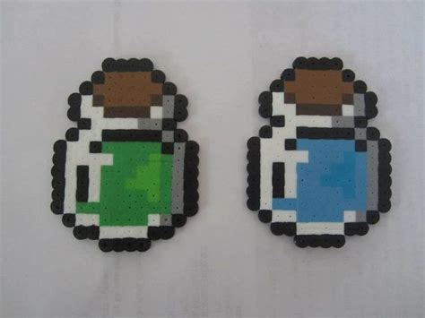 Sorry, we don't have location data just yet. Zelda Magic Potion Bottle Magnets by EkasCraftyCreations on Etsy, $6.00 | Melting beads
